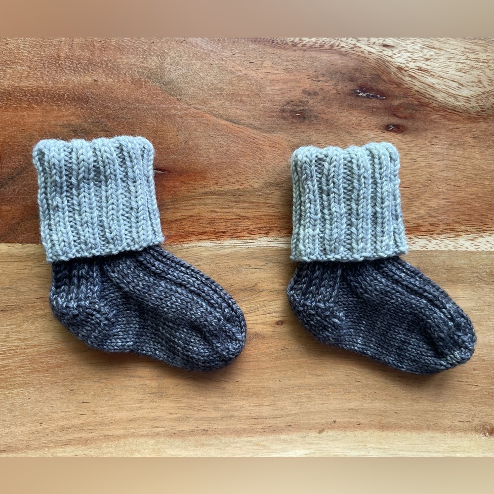 Last chance! 
Hand knit Baby Socks—that will actually stay on your baby’s feet!
